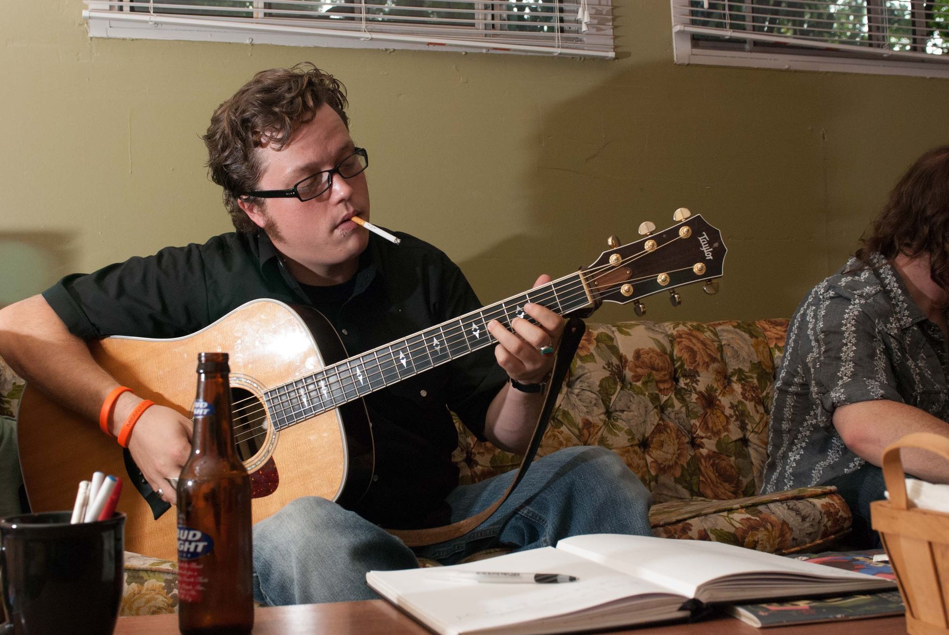 Jason Isbell writes song on guitar, Grey Eagle Music Hall, photographed by Asheville NC based Sandlin Gaither 