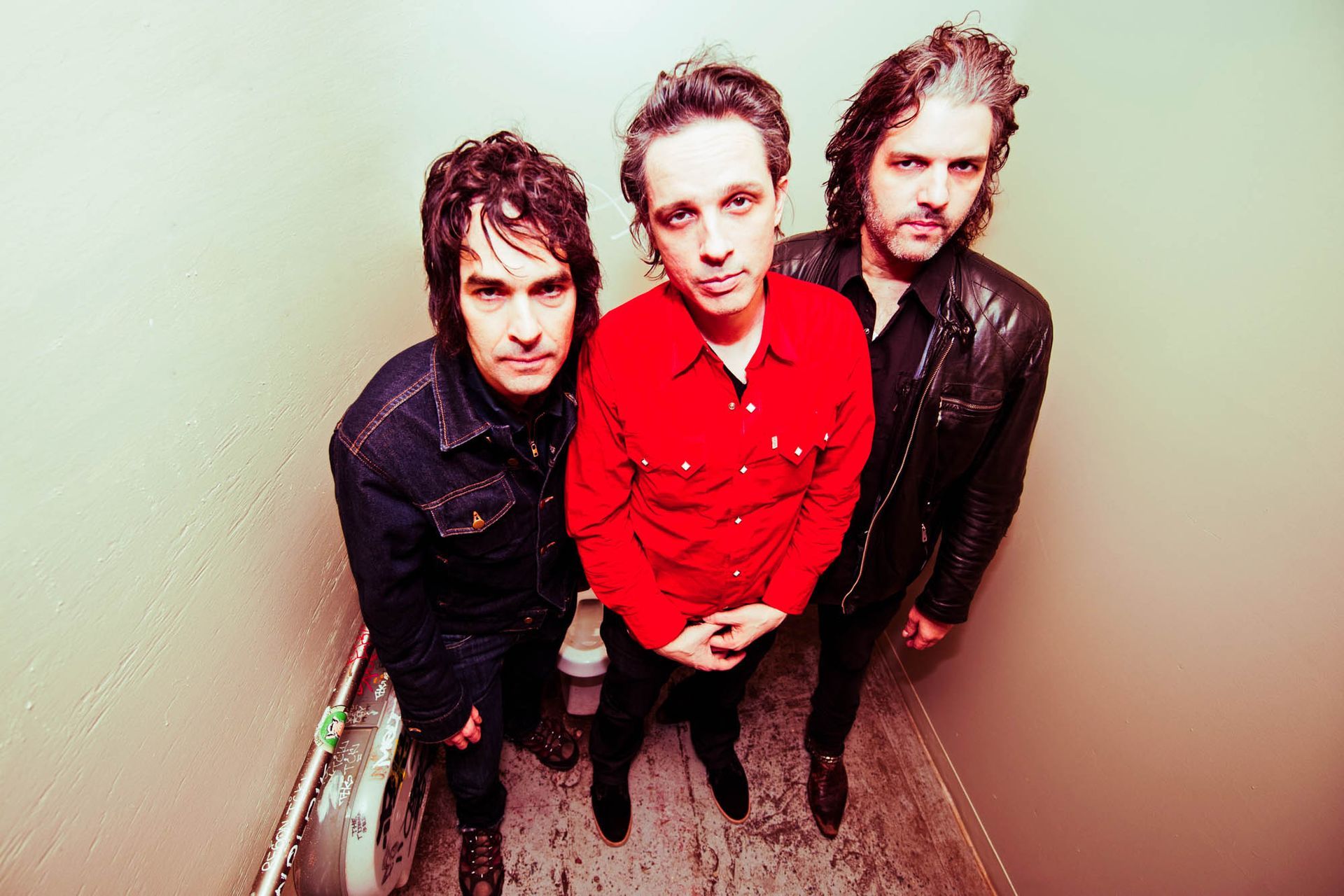 Jon spencer blues explosion in Asheville at Grey Eagle Music Hall, photographed in the mens' bathroom by North Carolina music photographer Sandlin Gaither 