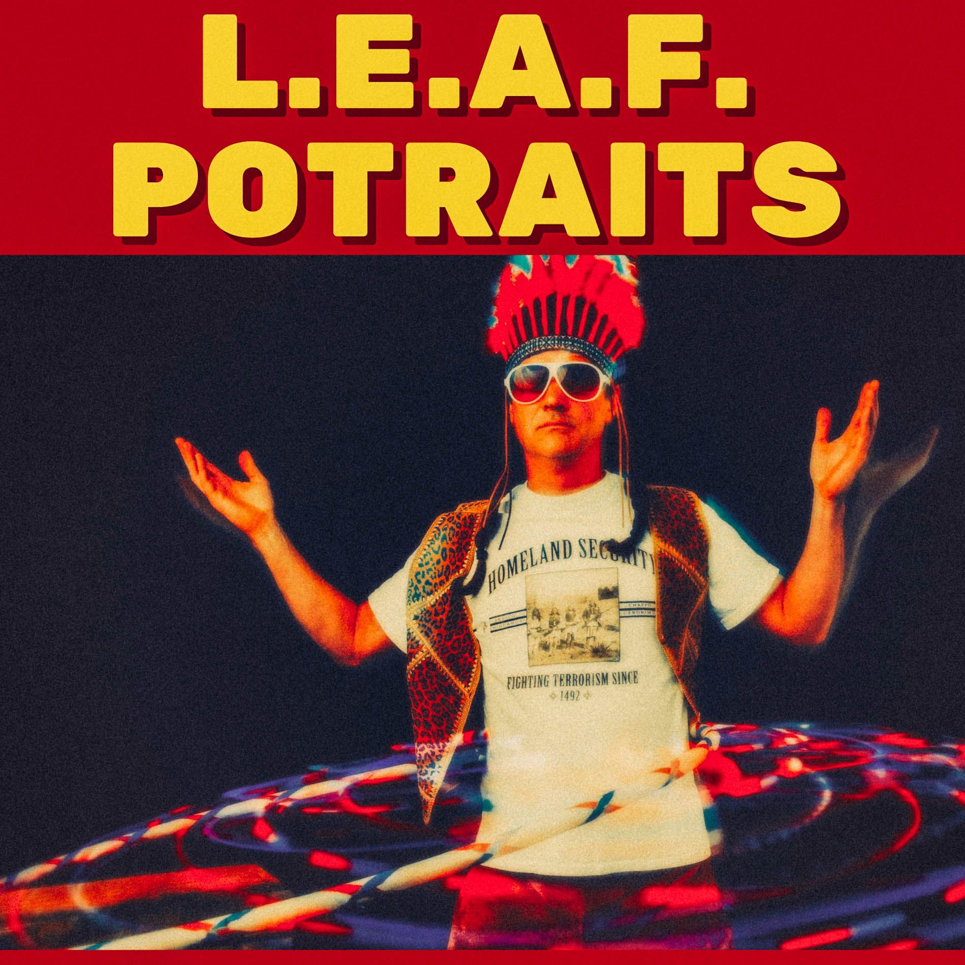 man poses for portrait backstage at LEAF, Asheville