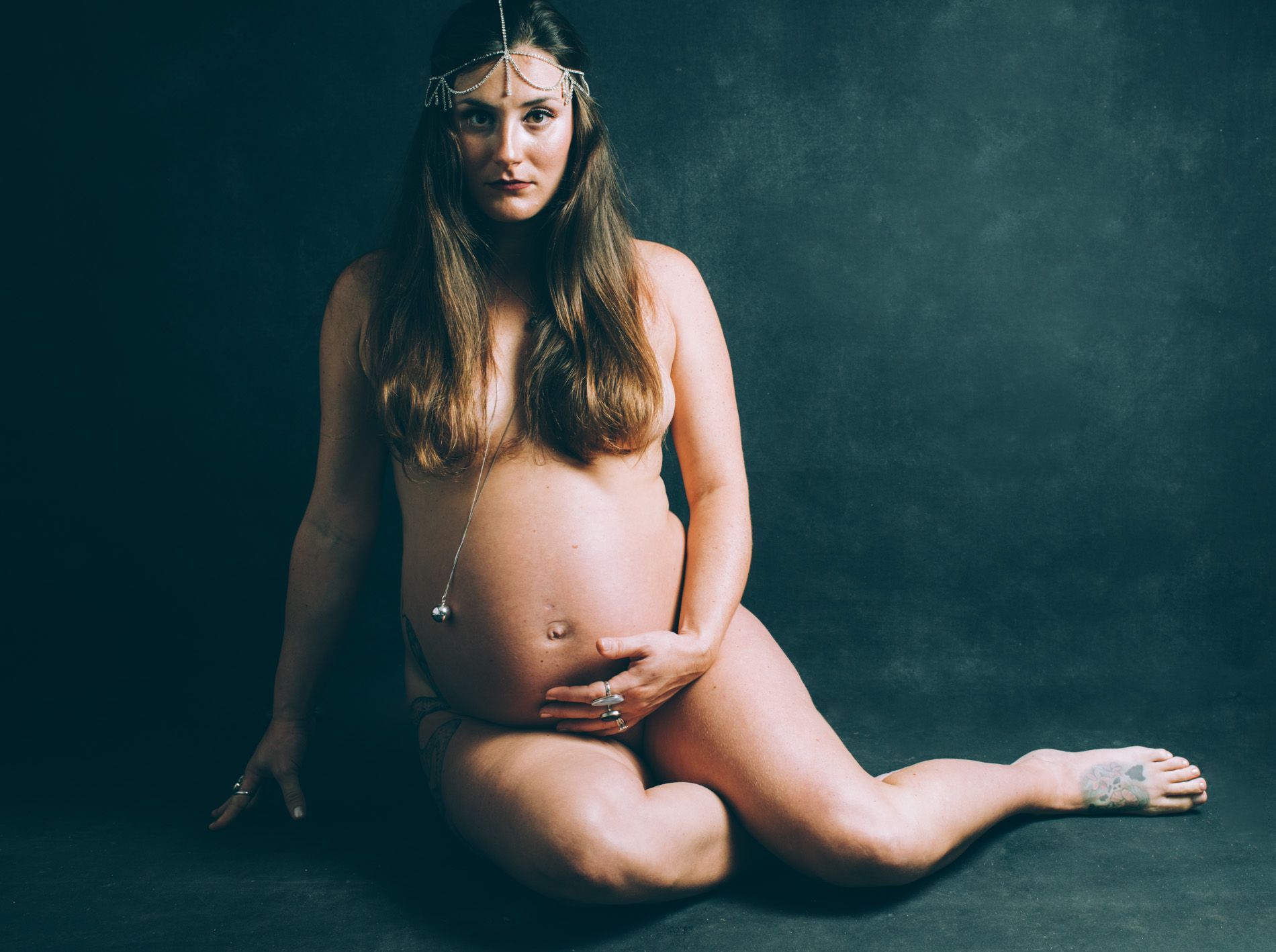 Studio maternity portrait with natural styling — Western North Carolina.