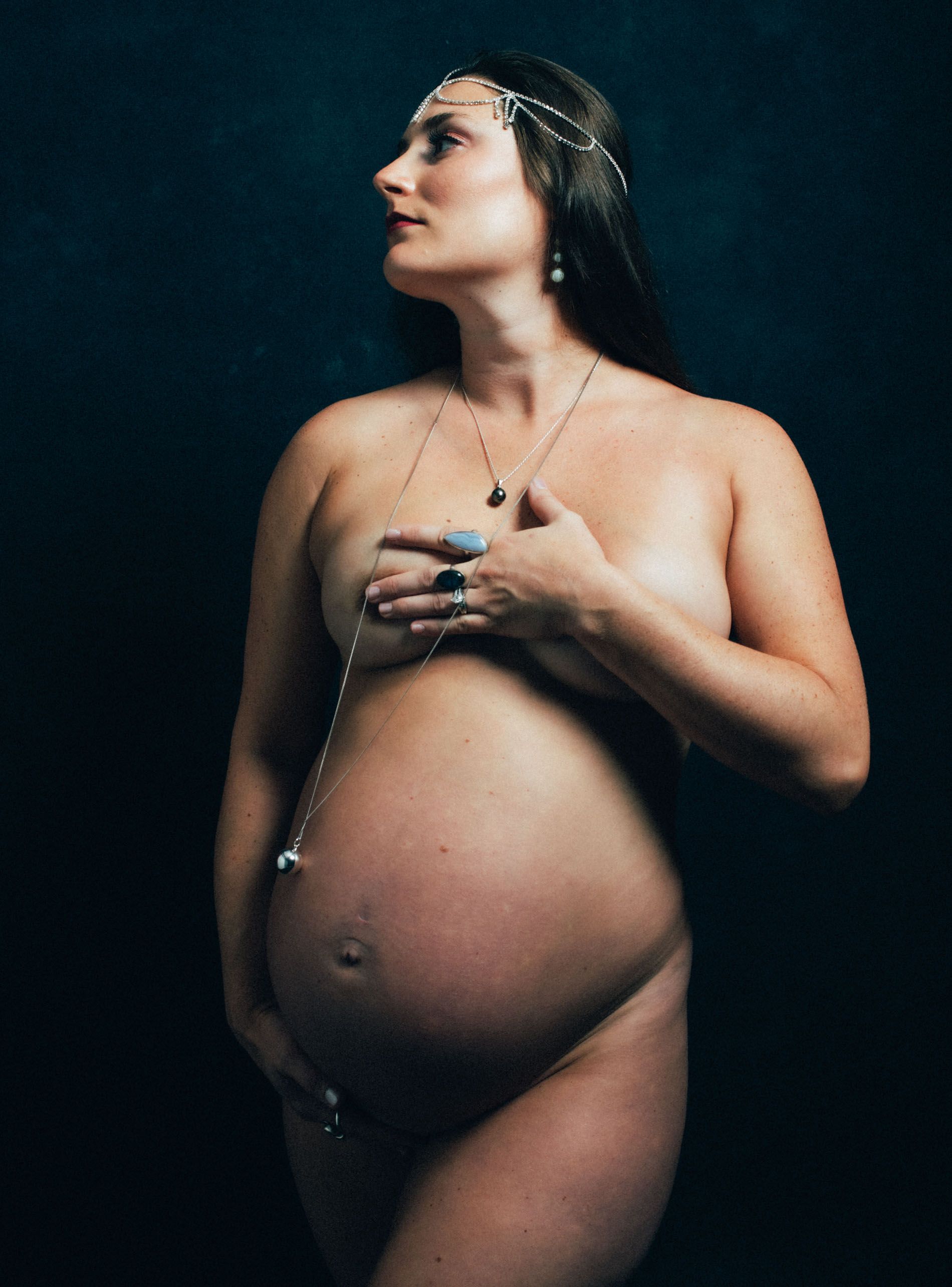 classic maternity poses in Asheville photo studio