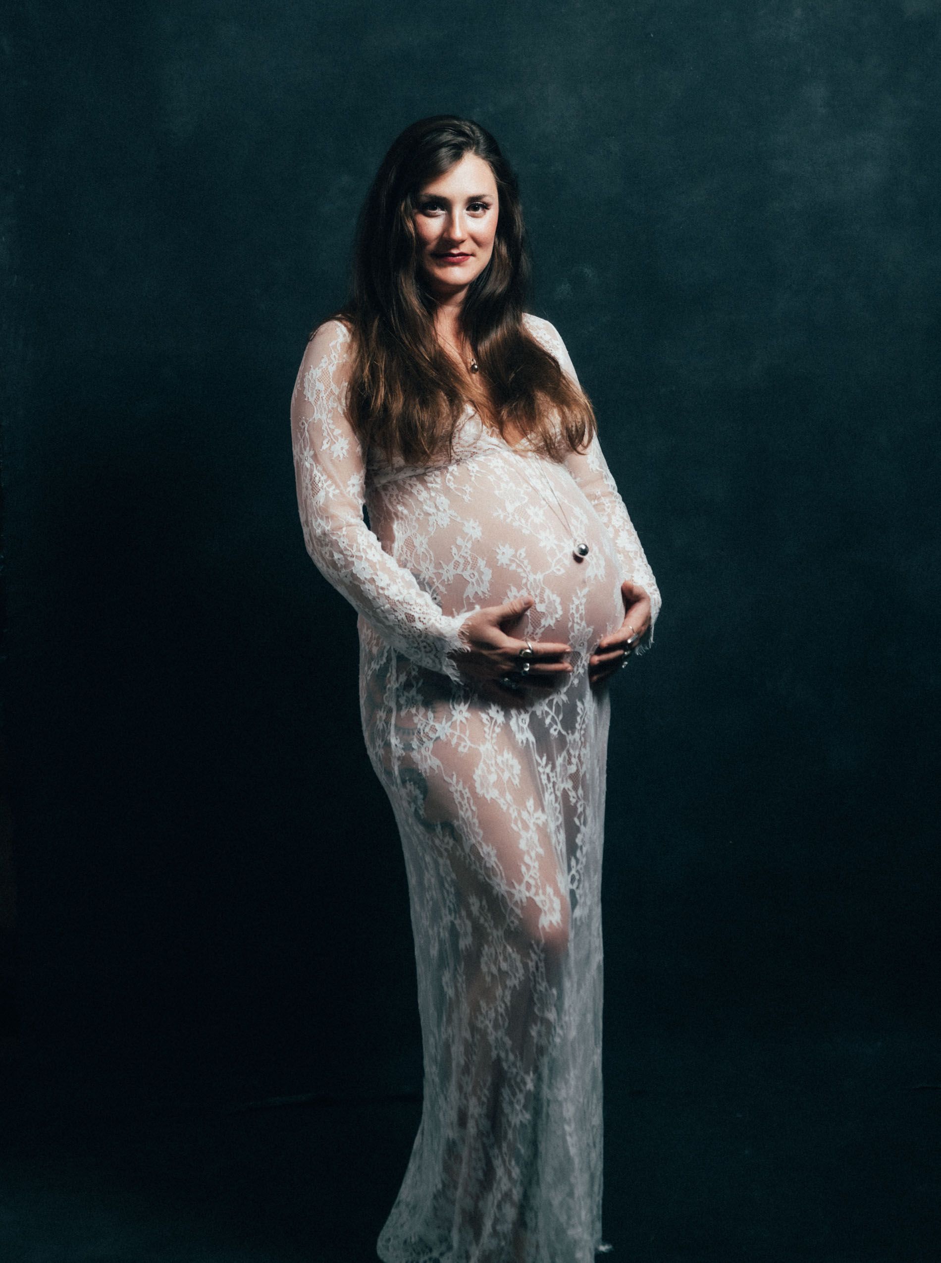 maternity dress mother in pregnant pose for asheville photo studio