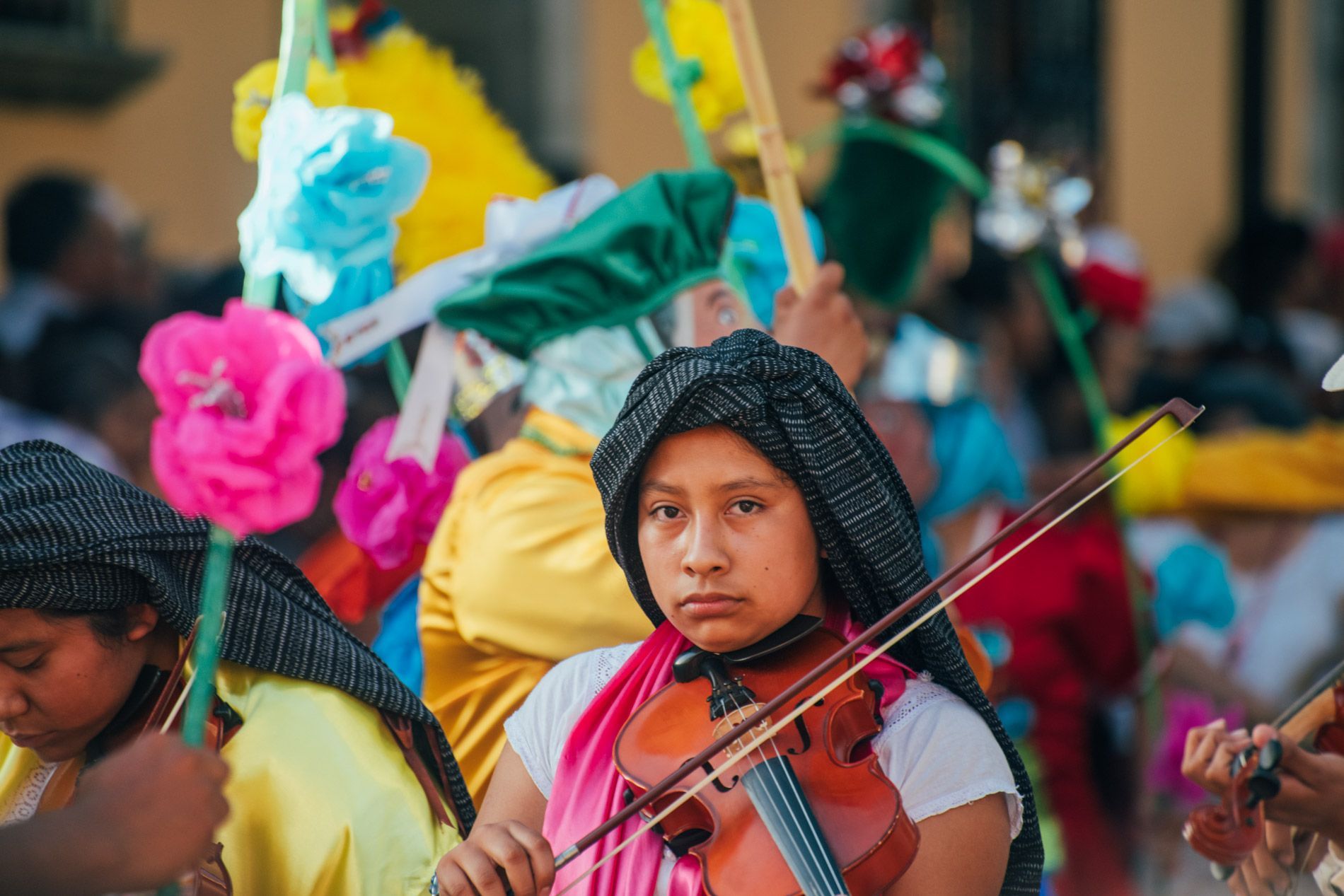 girl with violin, Guelaguetza festival, small group travel and food photography tours with Sandlin Gaither Explorer's Club
