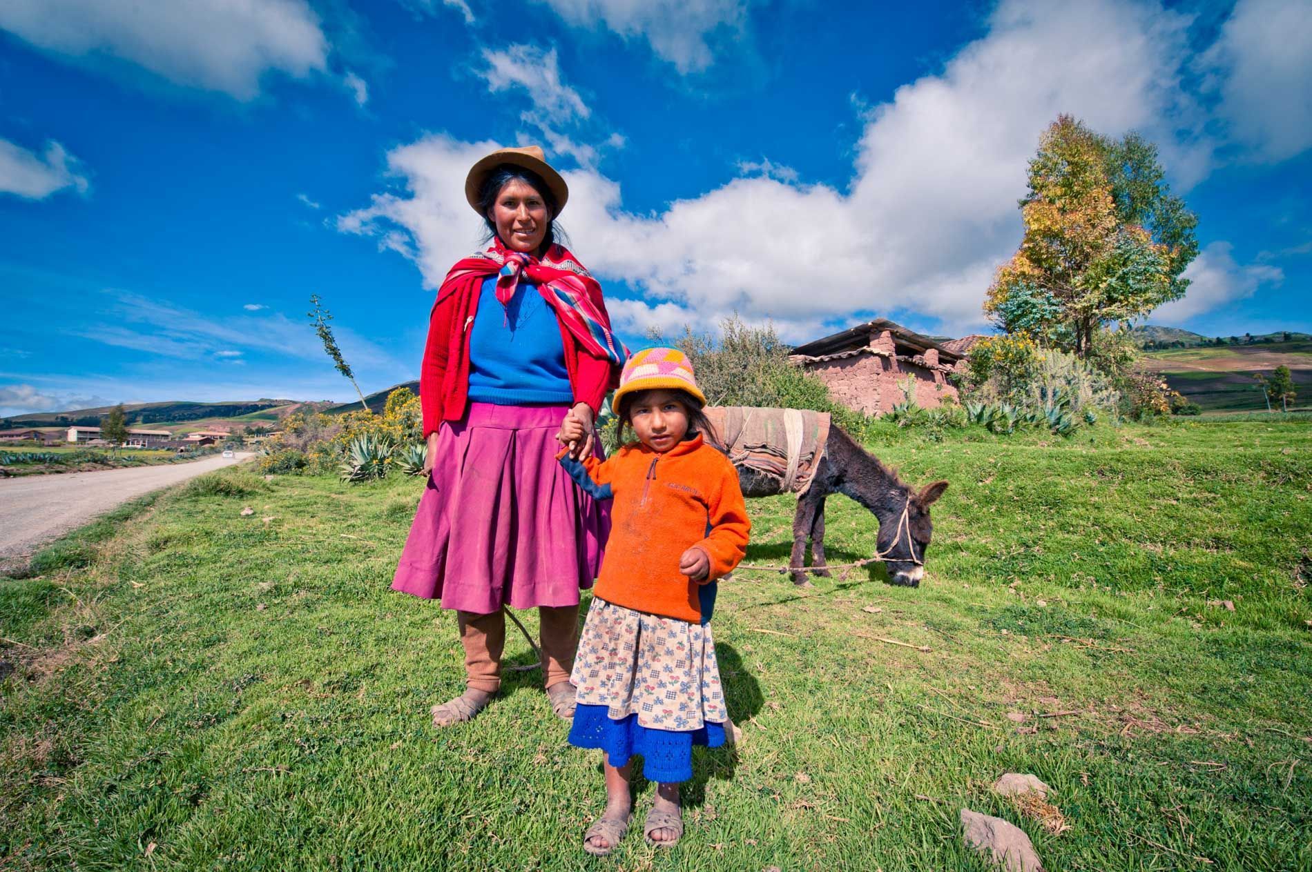 mother and daughter pose for portrait in rural Andes mountains, Peru, small group travel and food photography tours with Sandlin Gaither Explorer's Club