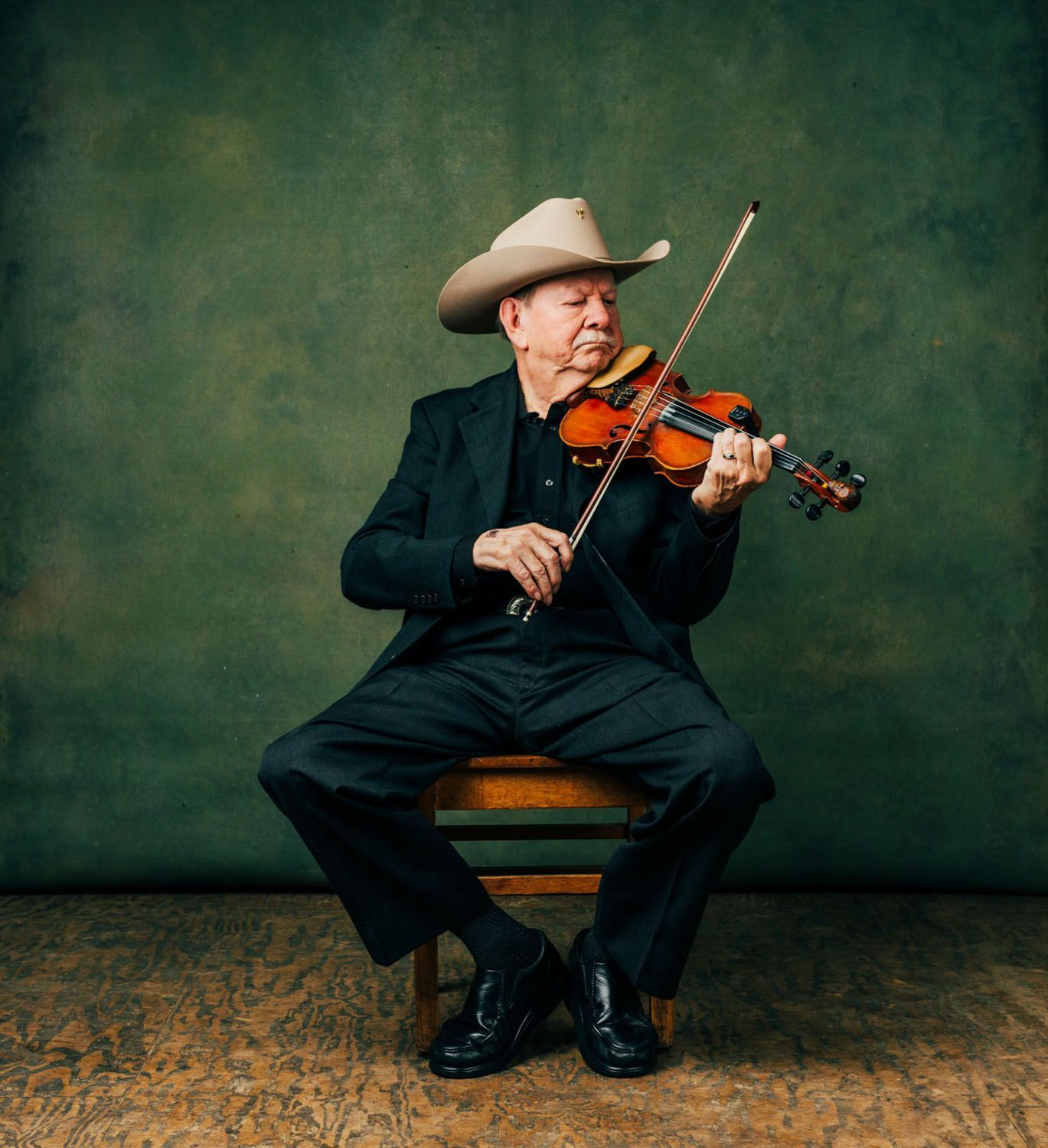 fiddler Bobby Hicks music portrait photographed at the Grey Eagle Hall in Asheville, NC by portrait photographer sandlin gaither 