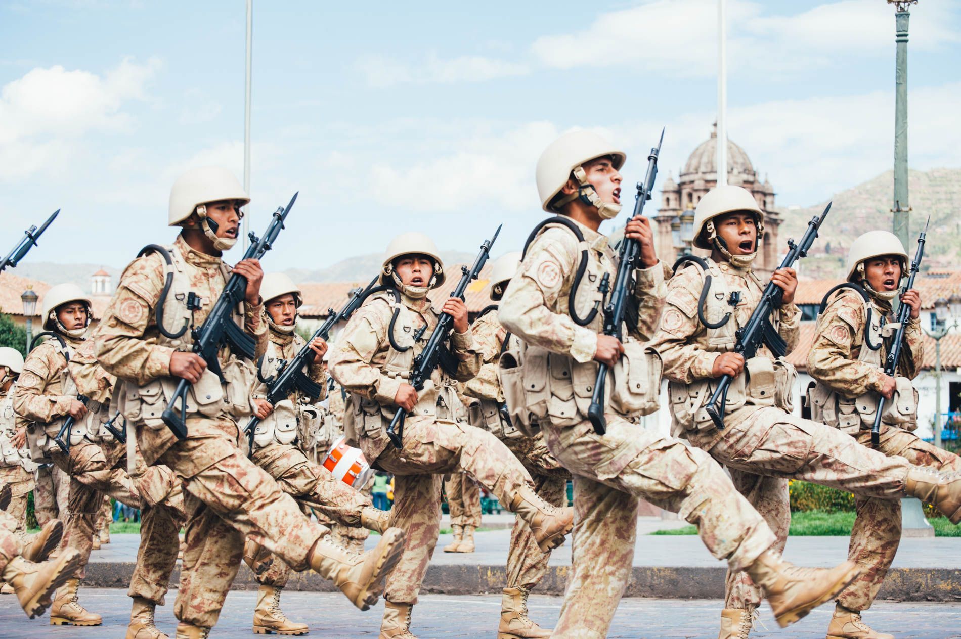 soldiers marching, Cuzco, Peru, small group travel and food photography tours with Sandlin Gaither Explorer's Club