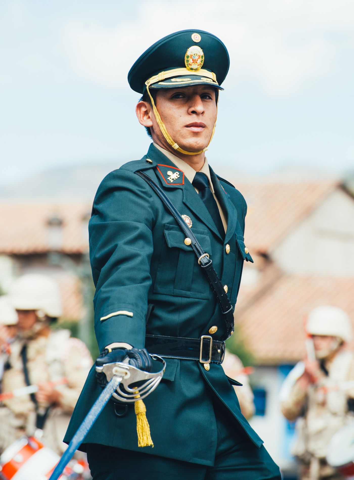 Peruvian soldier marching, Cuzco, Peru, small group travel and food photography tours with Sandlin Gaither Explorer's Club