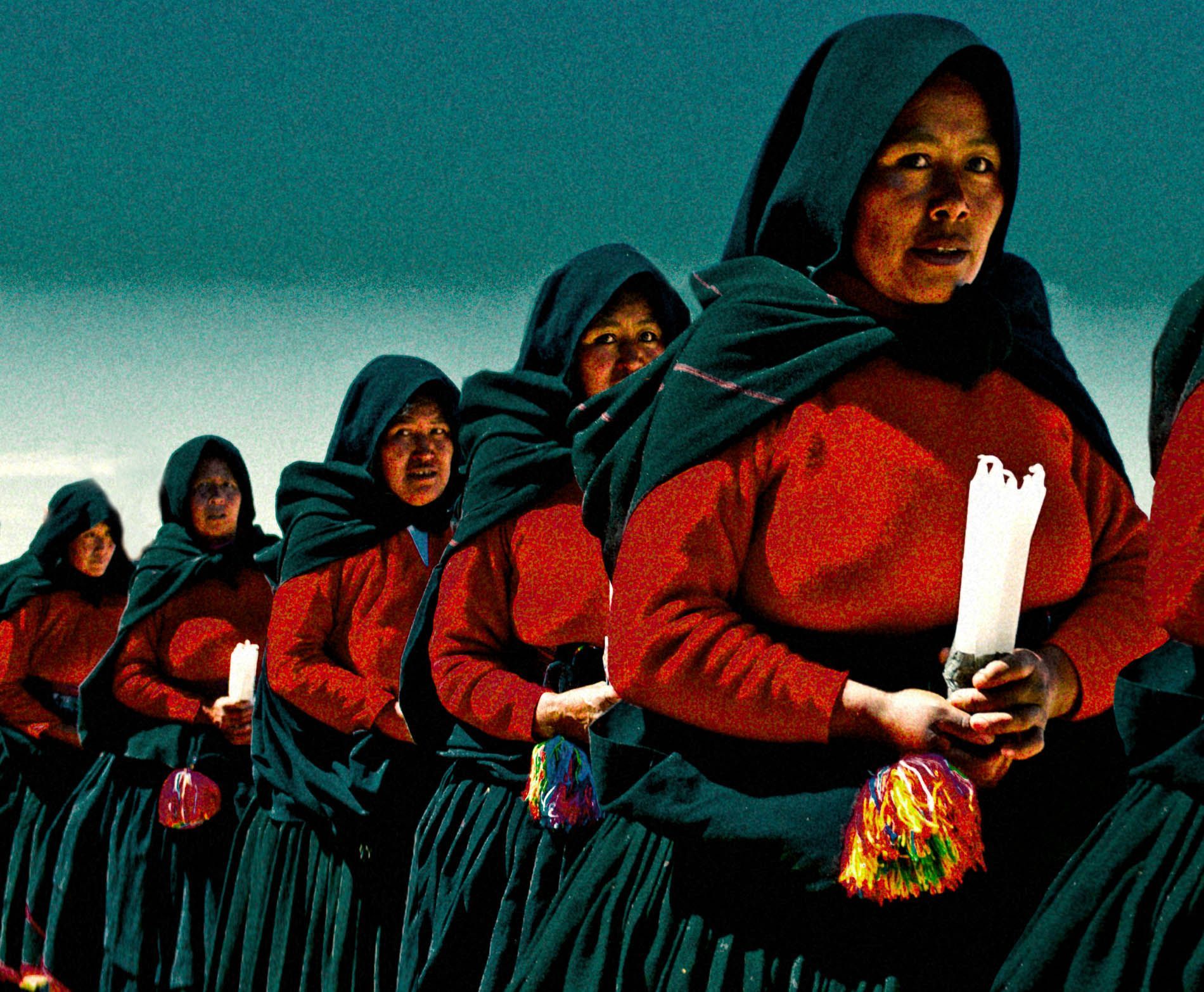 Women in ceremonial dress on Taquile Island — Peru travel photography tour