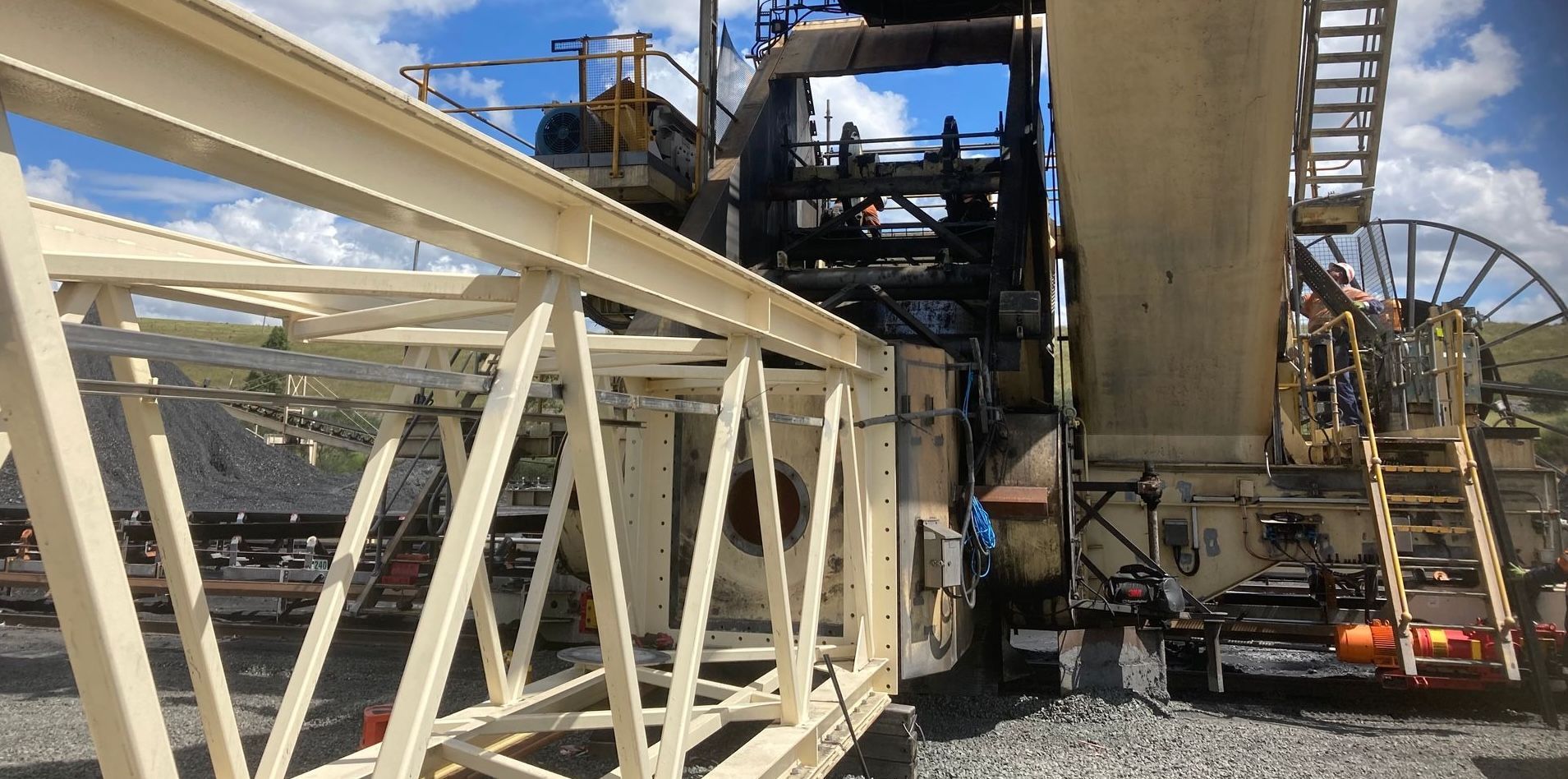 A Large Metal Structure Is Sitting In Front Of A Large Machine — JMG Maintenance & Fabrication In Muswellbrook NSW