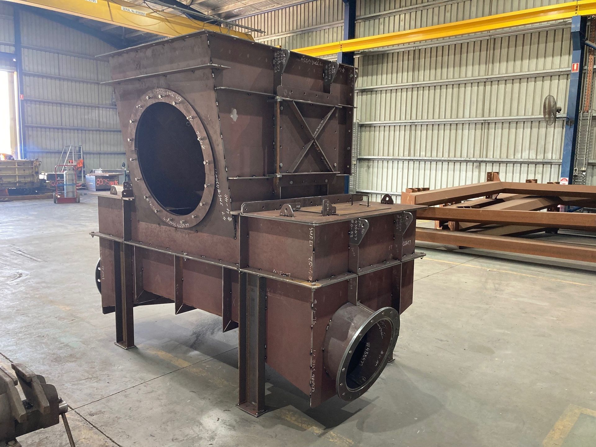 Male welder worker wearing protective clothing fixing and joining industrial construction oil and gas— JMG Maintenance & Fabrication In Tamworth NSW