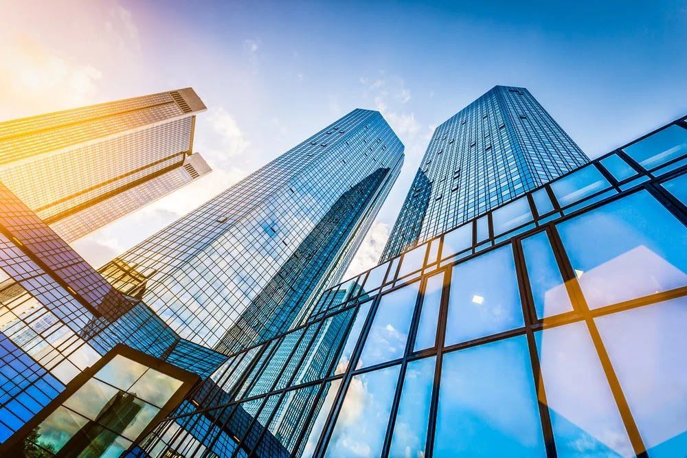 Looking up at really tall buildings