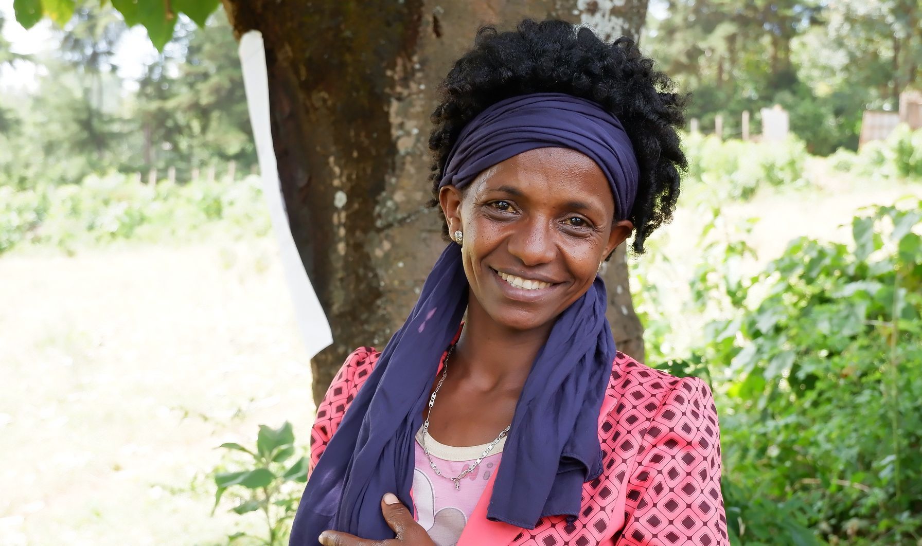 Ethiopian woman smiling and posing for the camera
