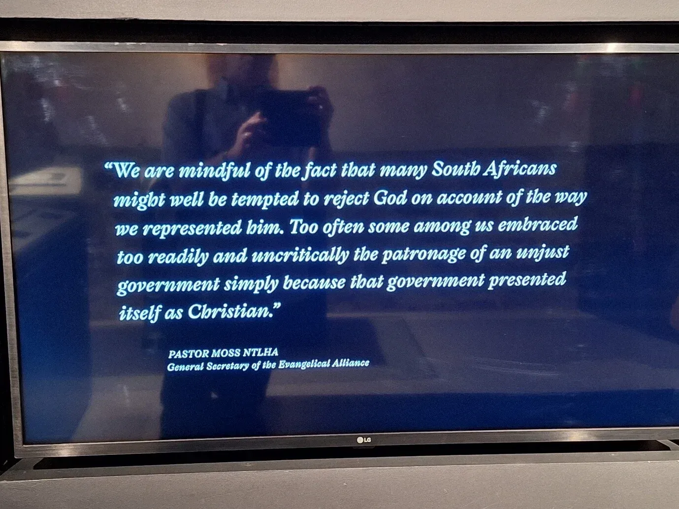 Quote on a screen: 