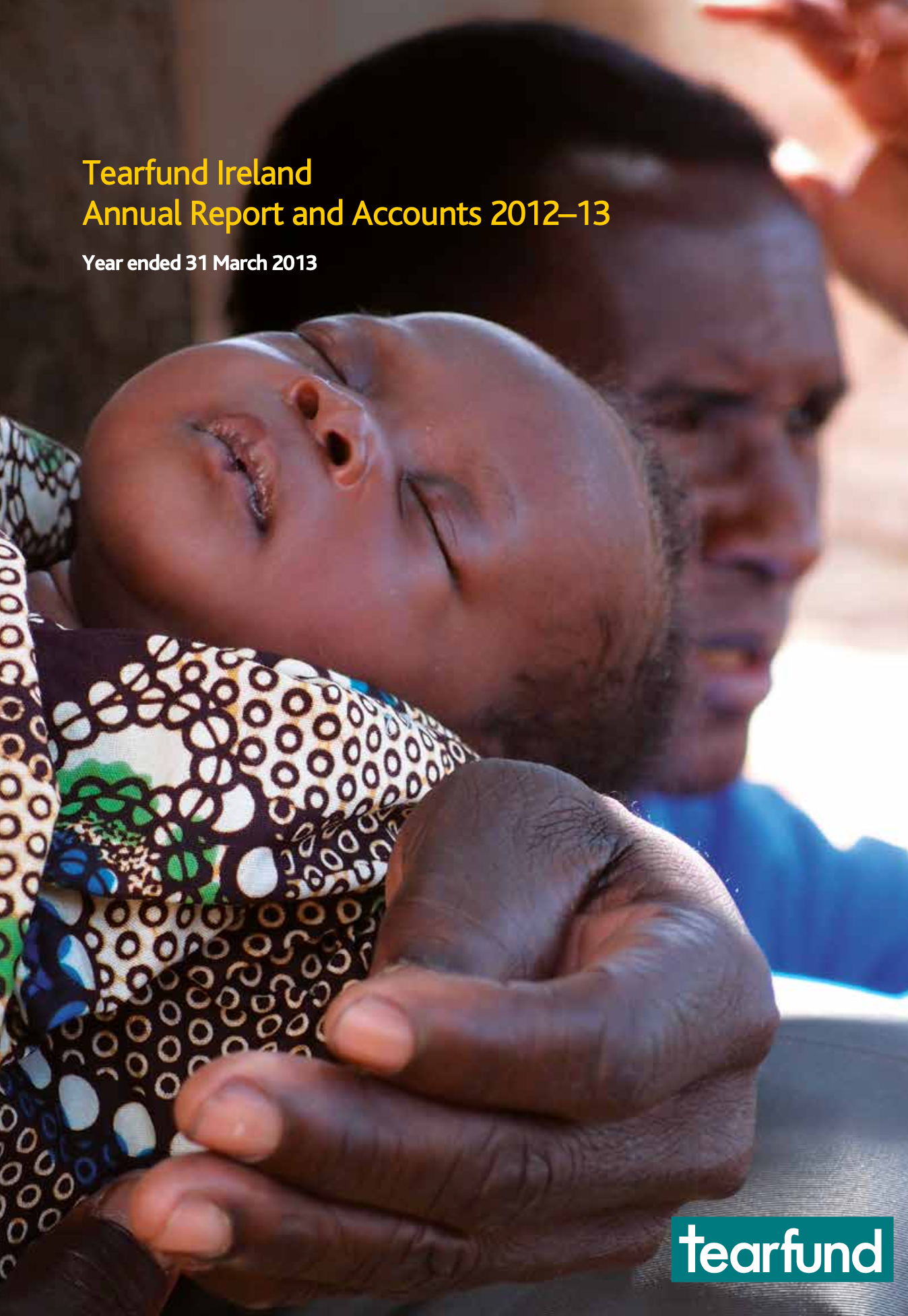 Tearfund Ireland annual report cover: baby held by a person, text at top, Tearfund logo at the bottom.