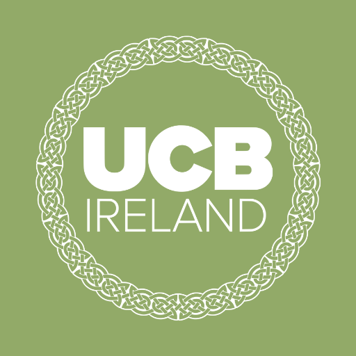 UCB Ireland logo: white text on green background, circular Celtic knot border.
