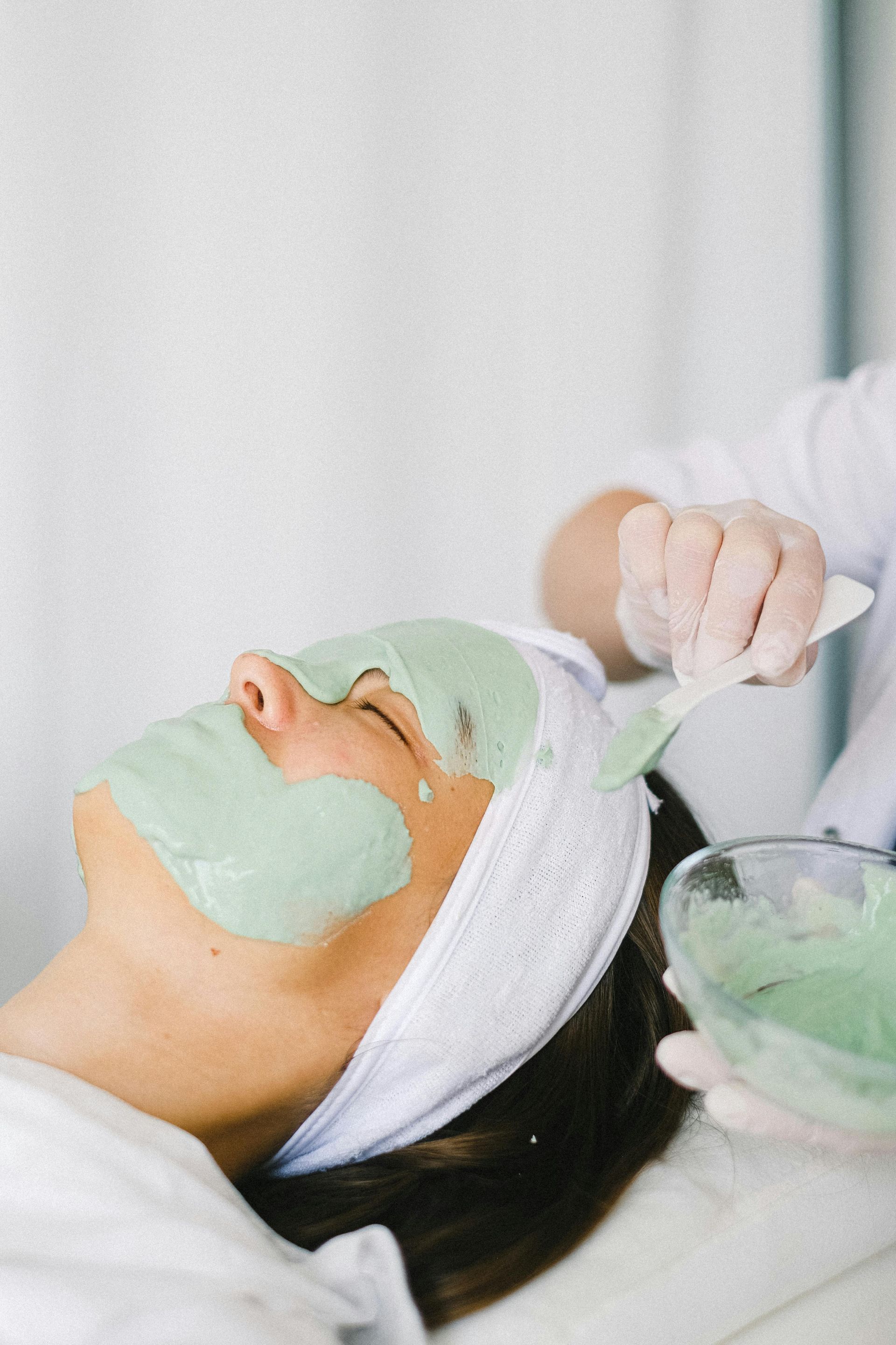 Woman receiving a facial