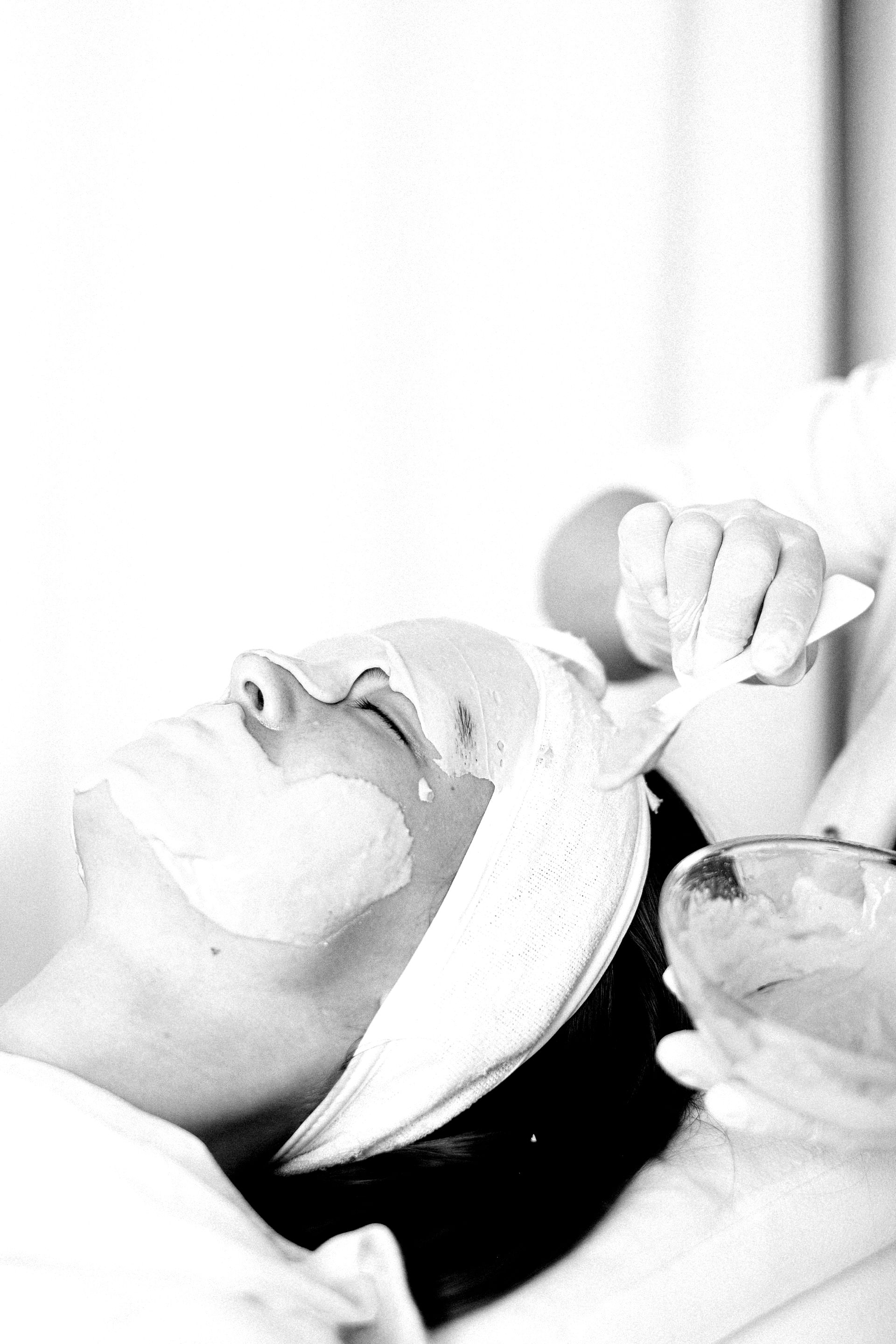Woman receiving a facial