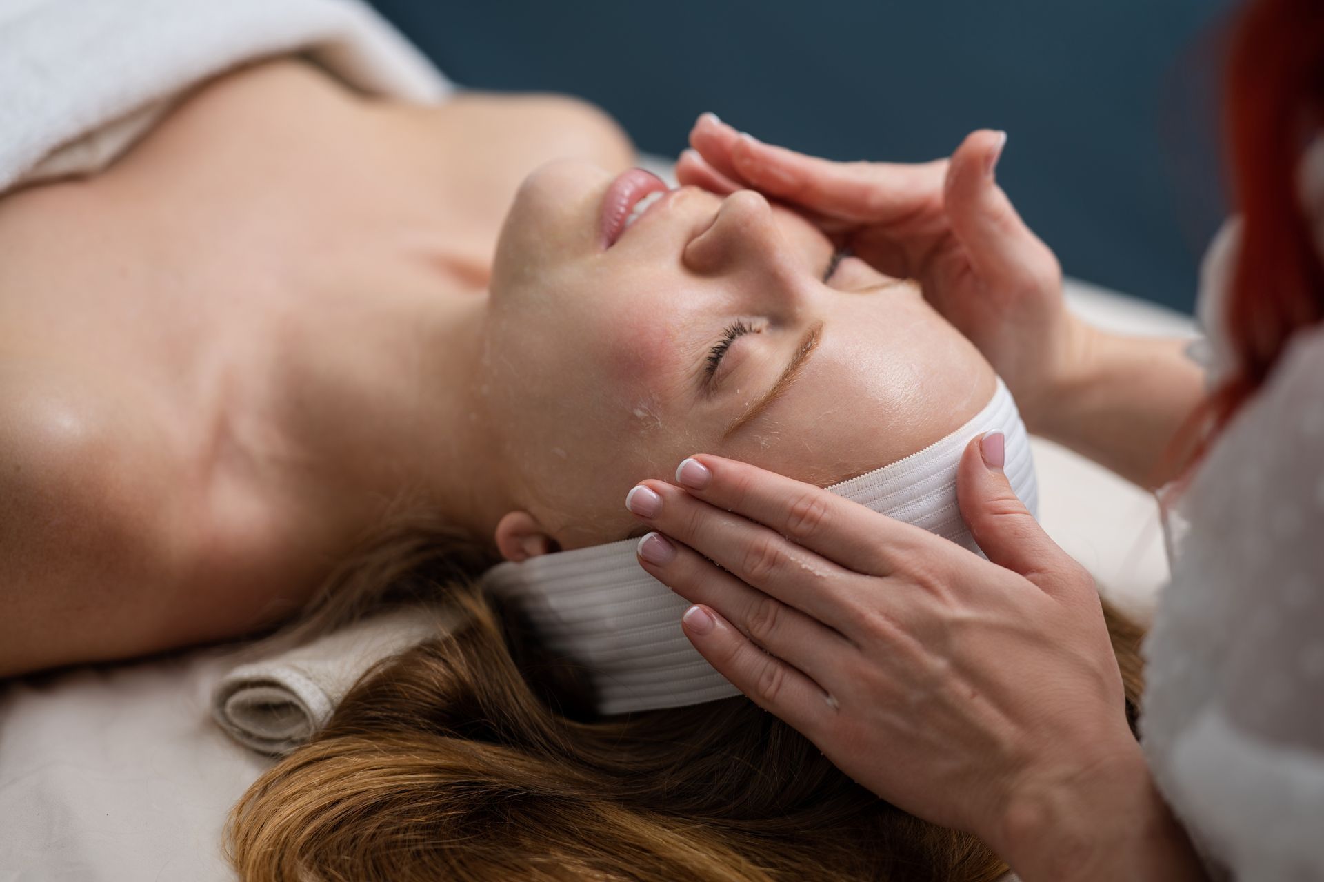 Woman receiving a facial