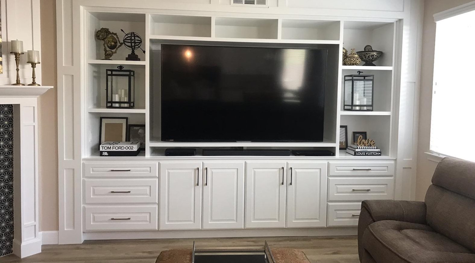 hand crafted entertainment center with alcove cabinets