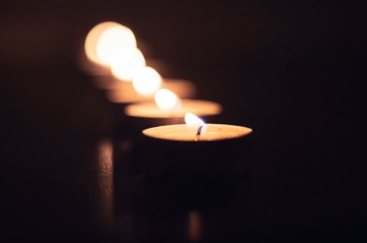 Memorial candles glowing during cremation services in Cedarburg, WI.