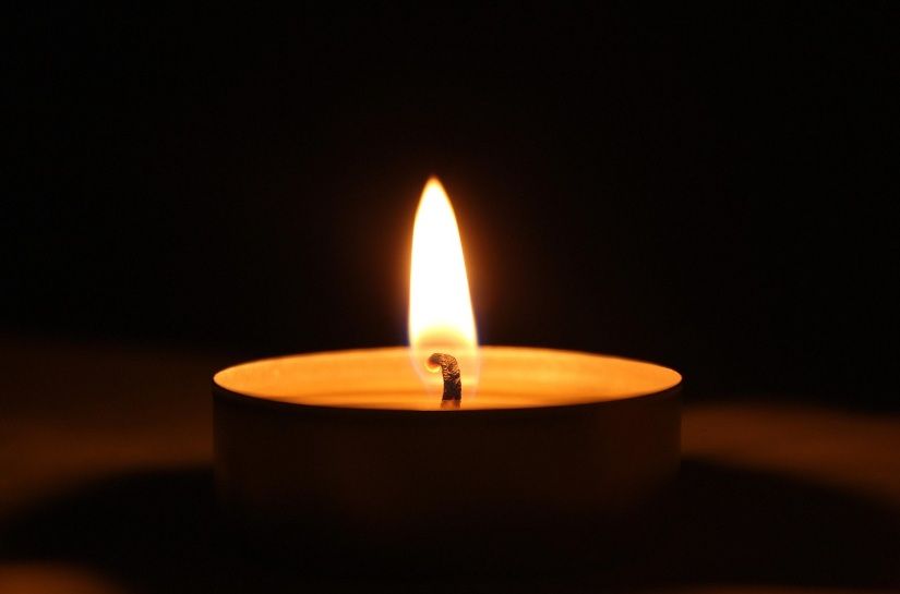 memorial candle representing a life story in Port Washington, WI.