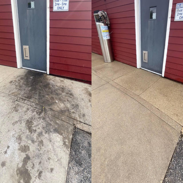 dirty concrete outside of a resturaunt