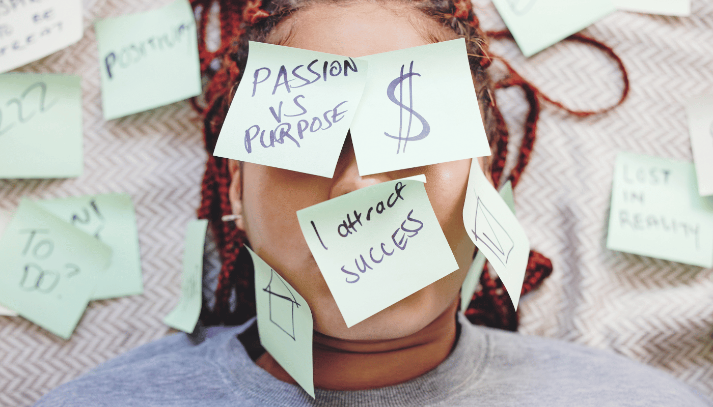 A woman with sticky notes on her face including one that says passion vs purpose