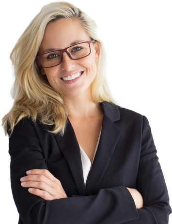 A woman wearing glasses and a suit is smiling with her arms crossed