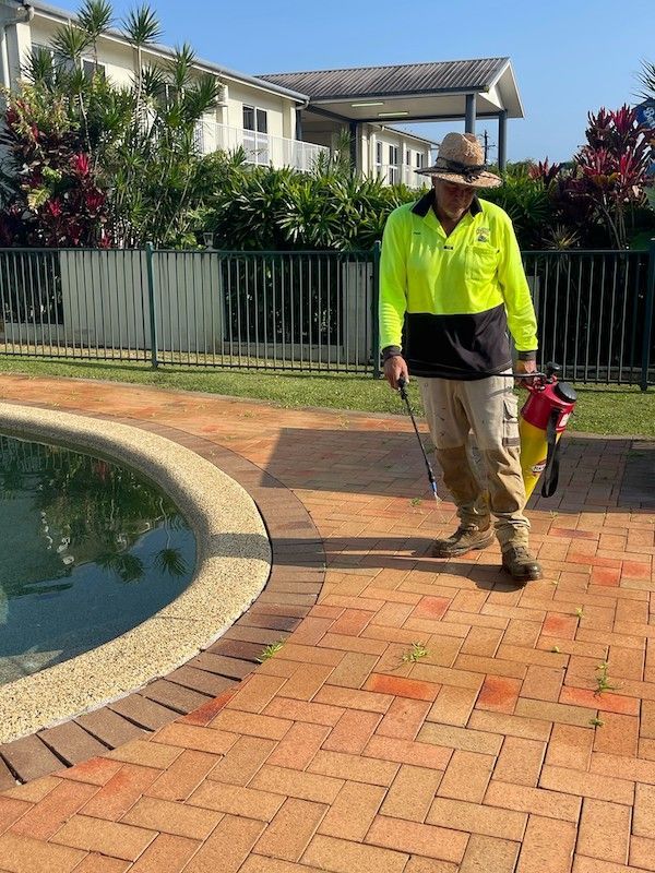 Man Mowing the Grass — Gardeners in Innisfail, QLD