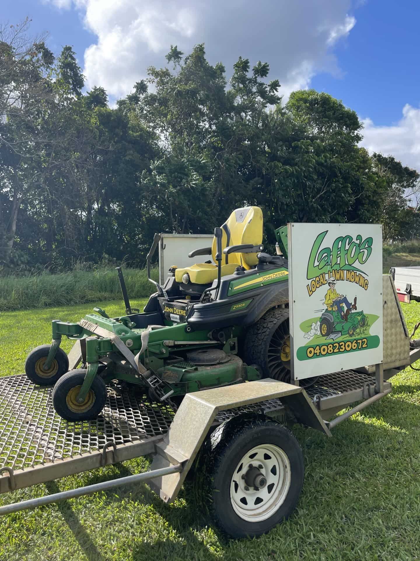 Man Using a String Trimmer — Gardeners in Innisfail, QLD