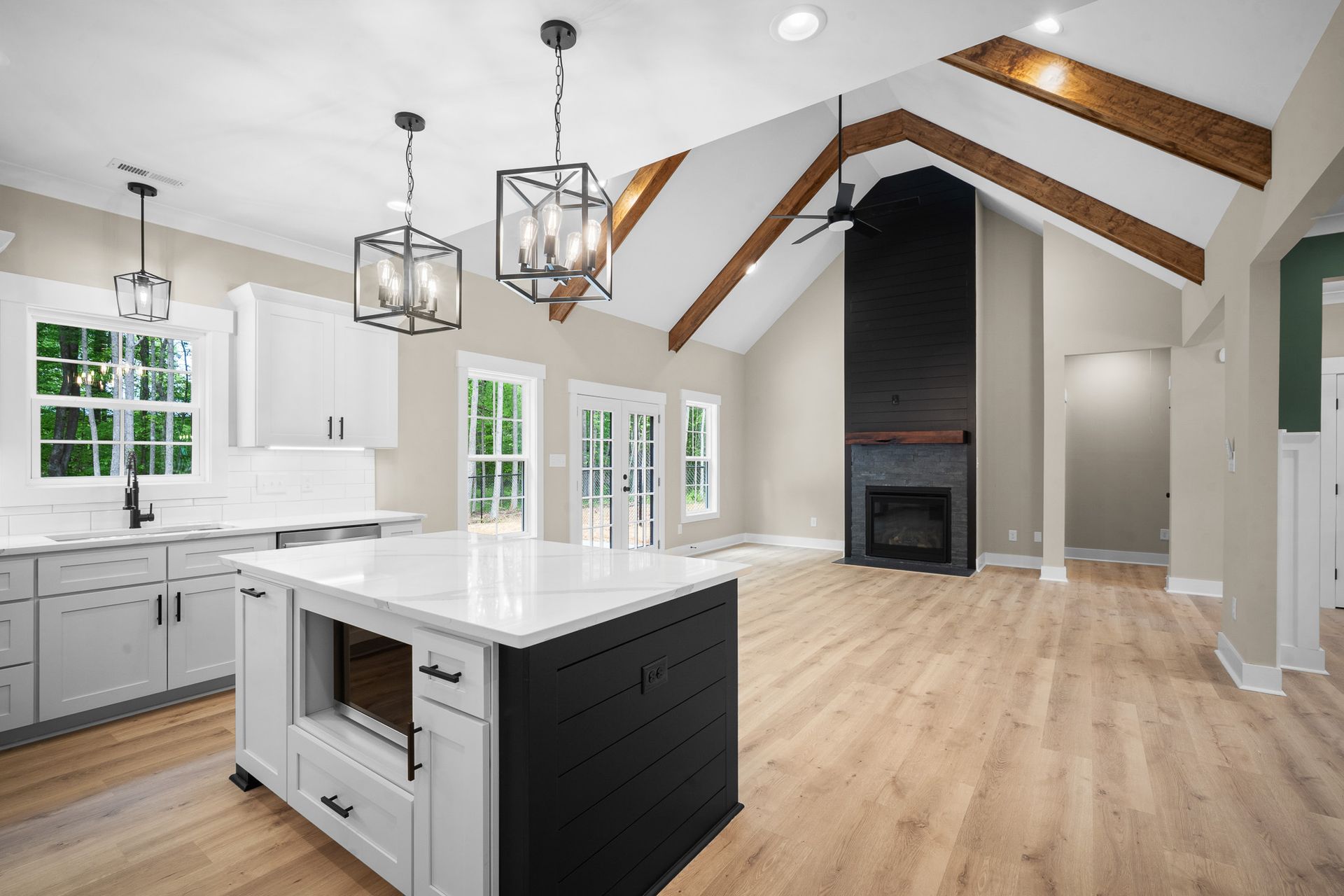 There is a large island in the middle of the kitchen.