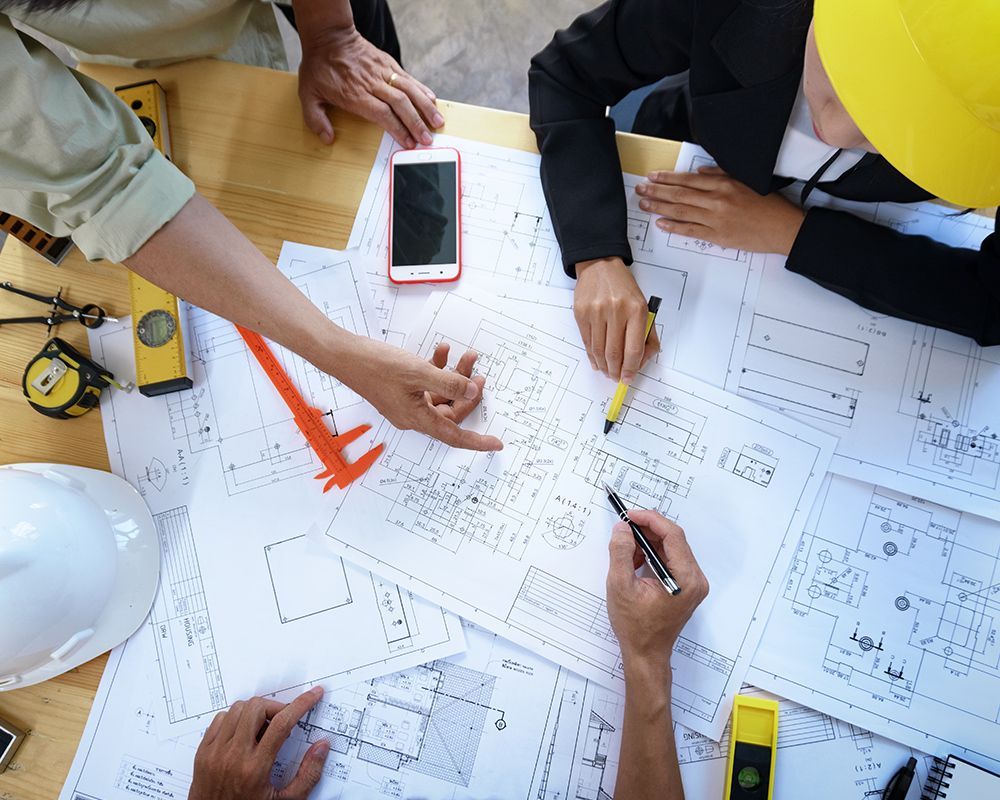 Worker Discussing About Construction Standards
