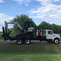 backhoe on truck