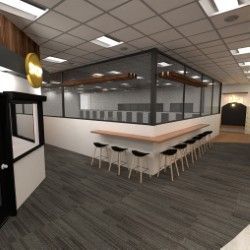 View of pickleball court with seating to view. Grey carpet flooring and ceiling lighting.
