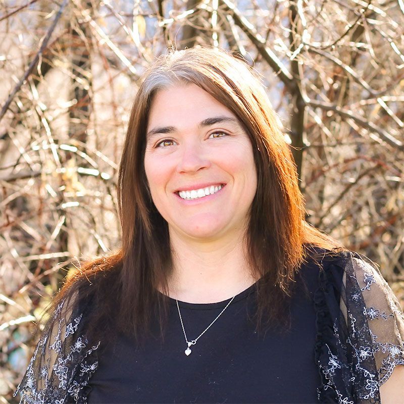 a portrait photo of piney duran, teacher at faith baptist academy