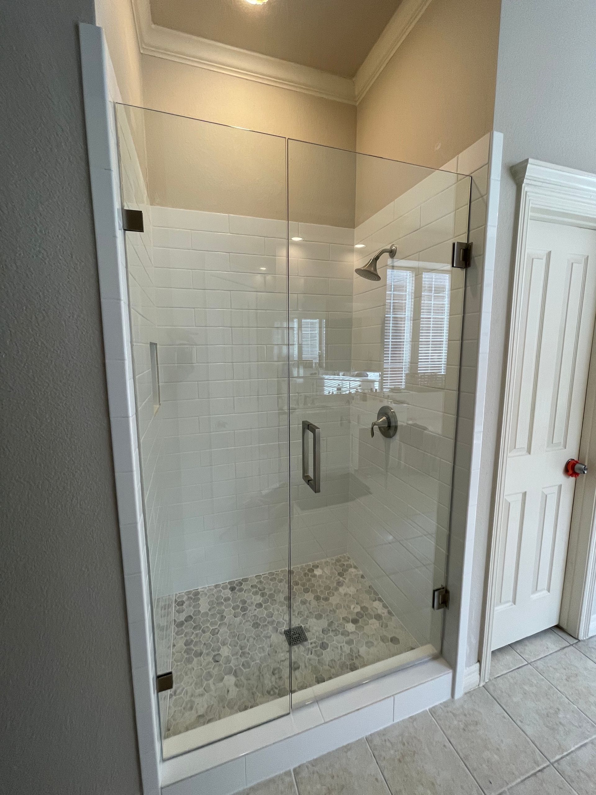 Frameless shower door