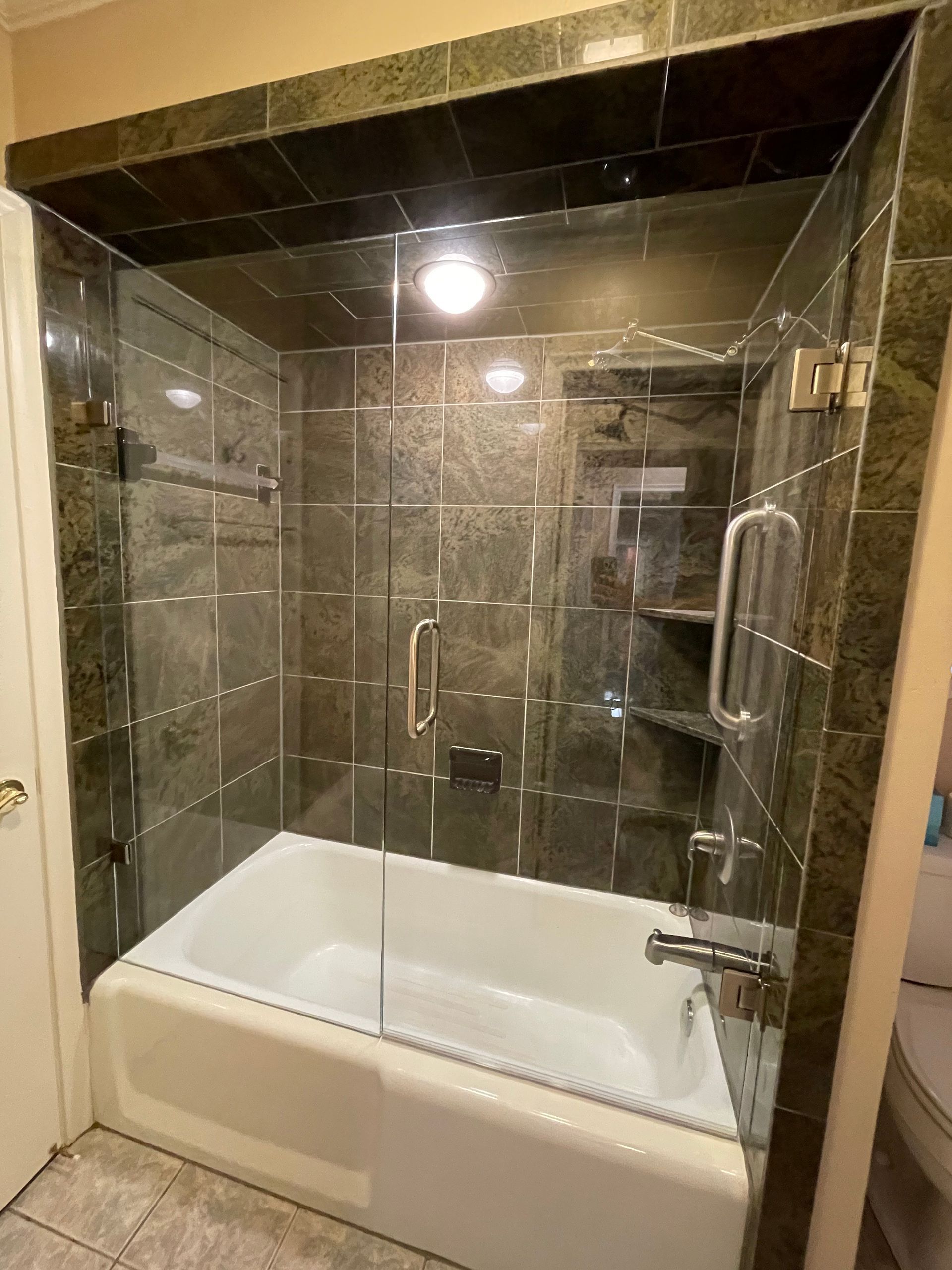 Frameless shower door