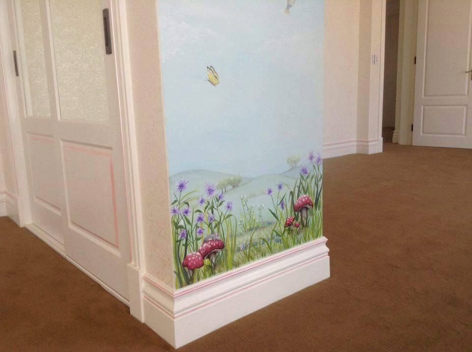 A hallway with a painting of flowers and mushrooms on the wall.
