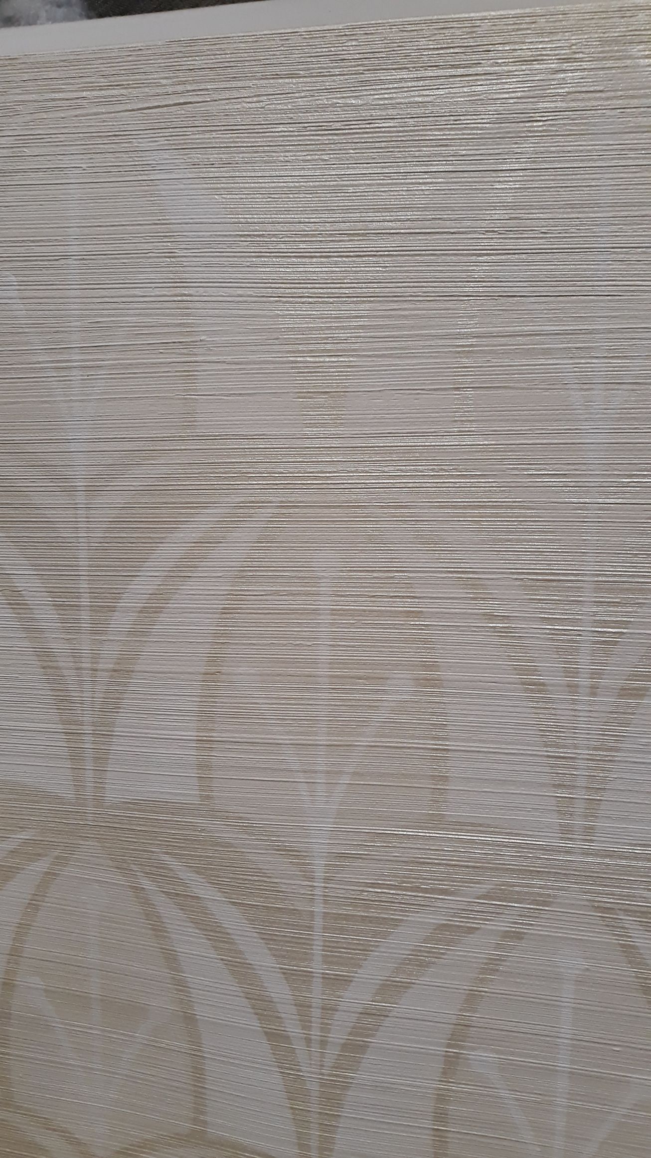 A close up of a body of water on a beach.