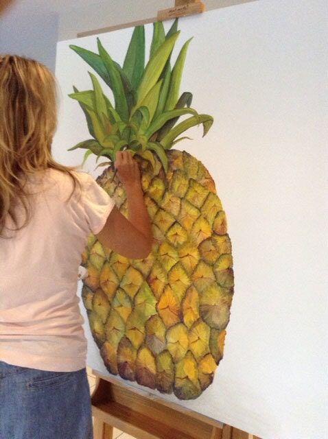 Woman Finished Painting The Pineapple — Artizans International Specialised Paint Finishes in Robina, QLD