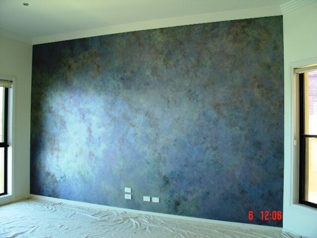 Room With A Large Blue Wall — Artizans International Specialised Paint Finishes in Robina, QLD