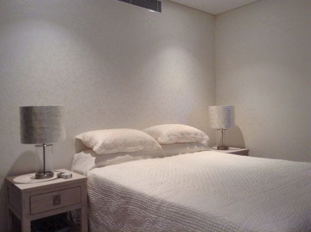 Crystal Pearl Finish Wall In A White Bedroom — Artizans International Specialised Paint Finishes in Robina, QLD