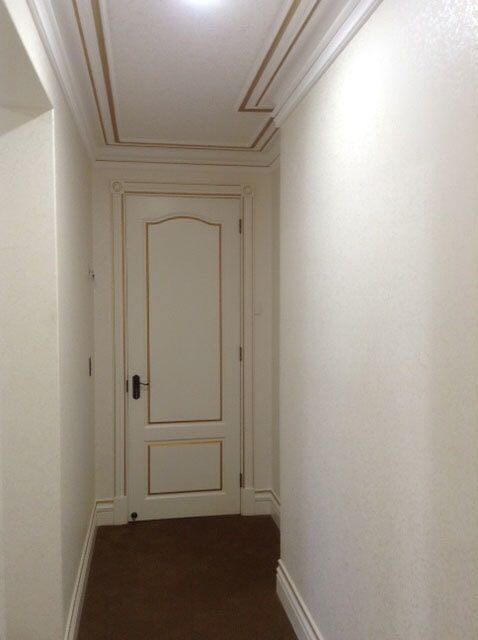 Hallway With White Walls And White Door — Artizans International Specialised Paint Finishes in Robina, QLD