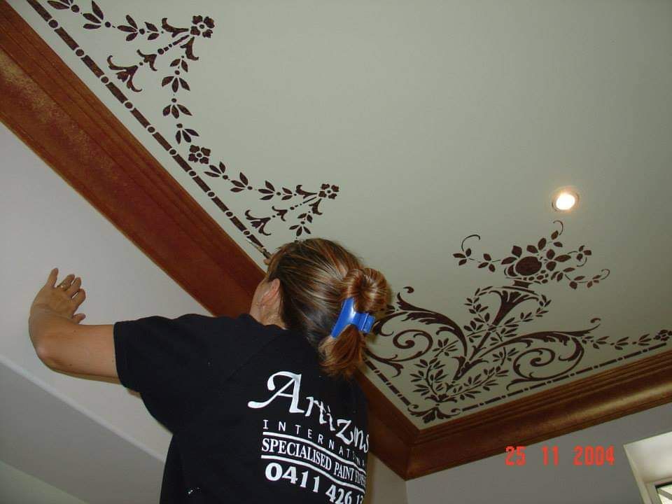 A woman wearing a shirt that says arizona on it