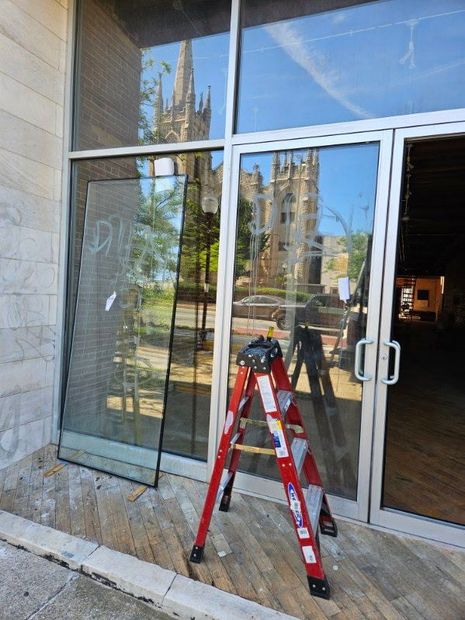 Commercial storefront window glass replaced in an aluminum frame in Baltimore, MD