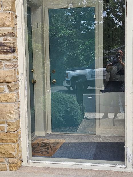 Residential entry door with full-view replacement glass in Baltimore, MD