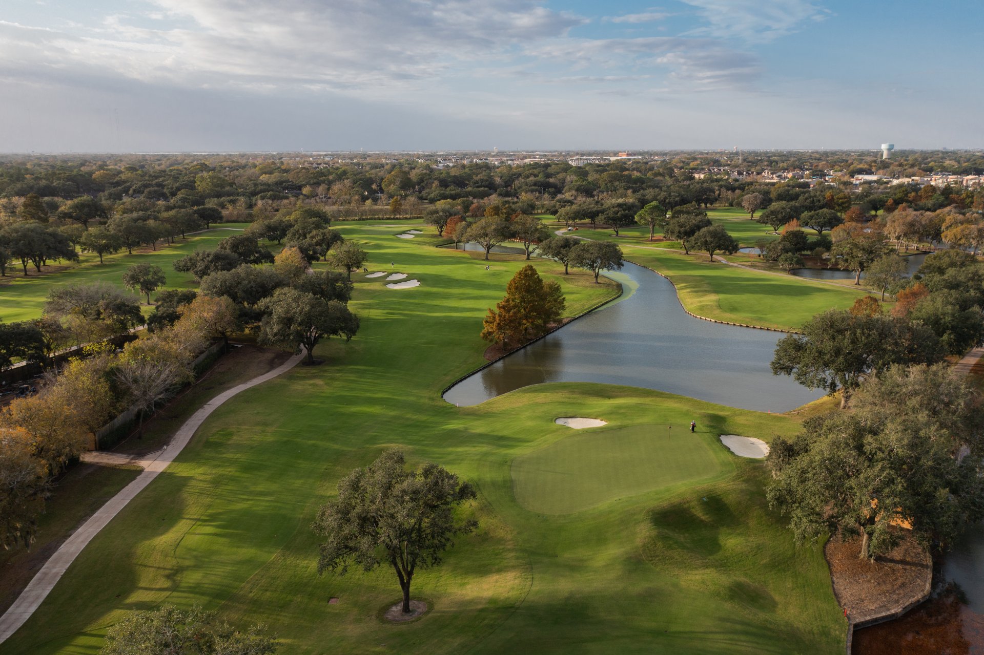 Aerial over fairway and lake
