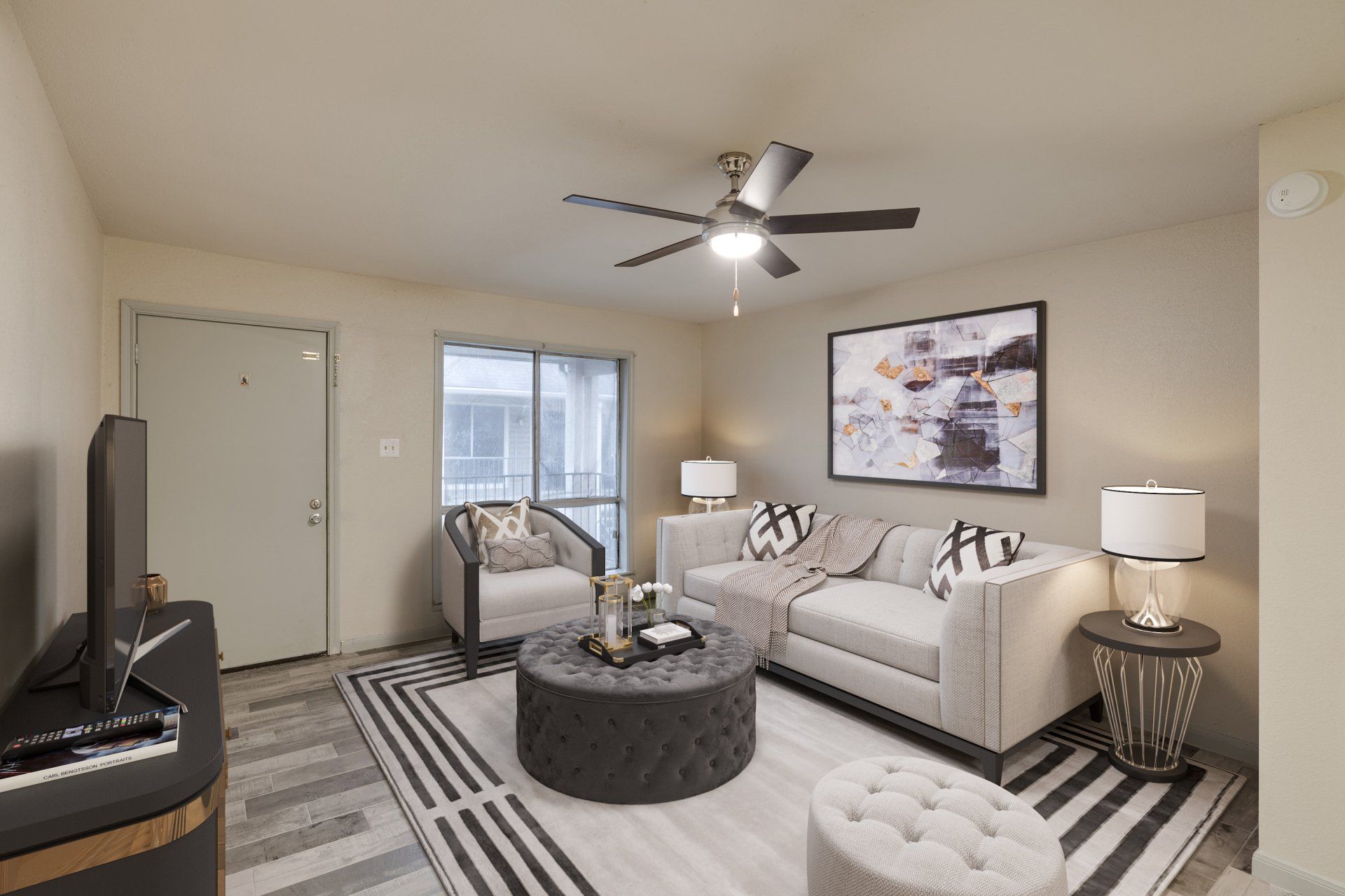 Spacious living room with luxury plank flooring at  Gia Oak Forest, Houston.