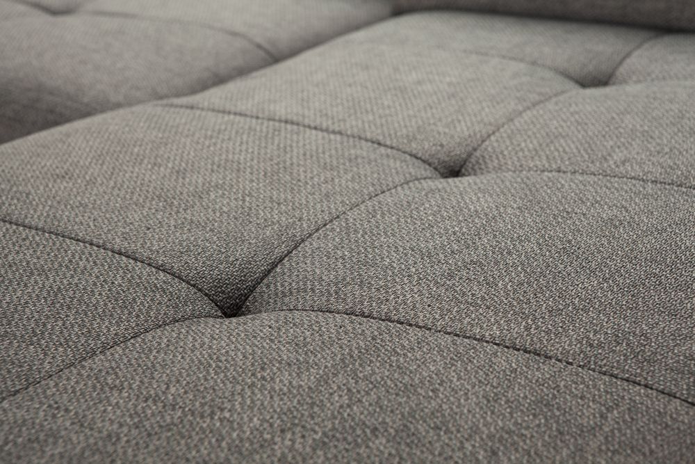 Close-Up of A Gray Tufted Upholstered Cushion Fabric with Stitched Seams — Broadbeach Carpet Cleaning In Benowa, QLD