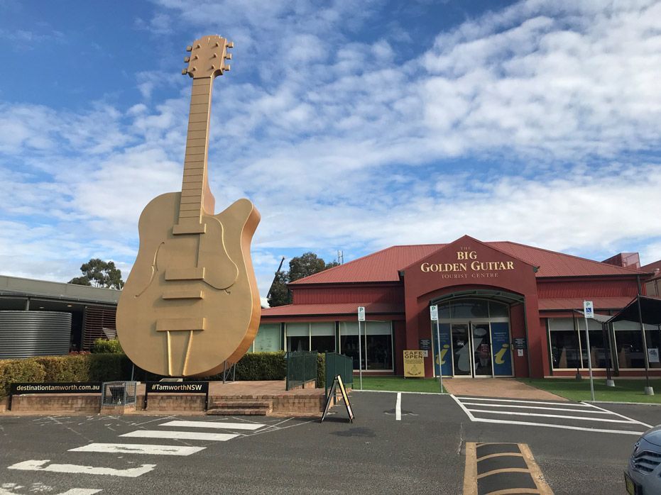 Big Golden Guitar — Edwards & Froud Building Services Pty Ltd in West Tamworth, NSW